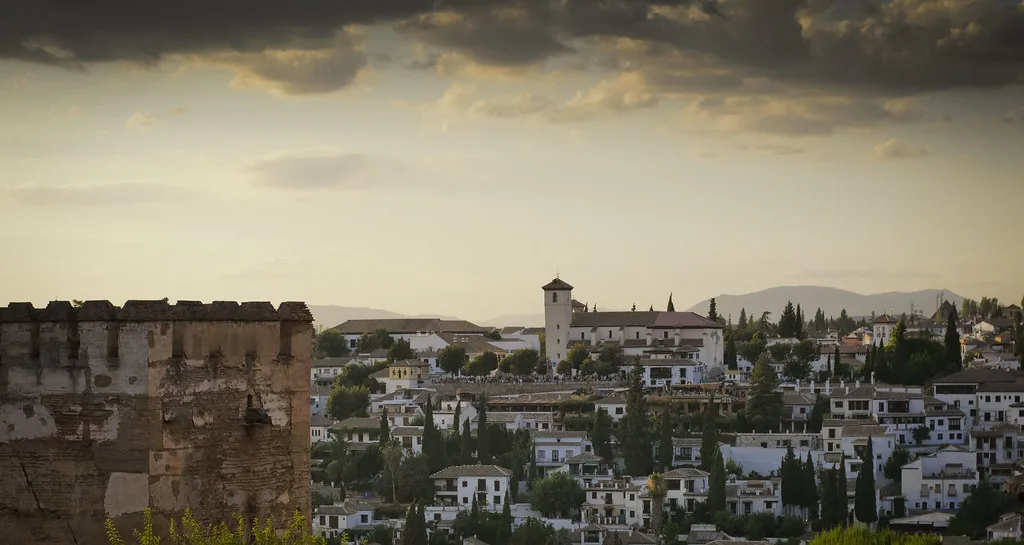 Smart-casual street style in Granada, illustrating the polished look locals favour over athletic wear