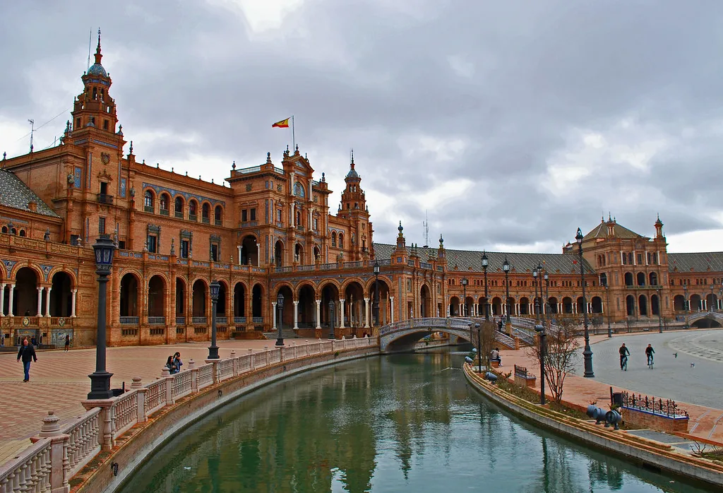 Smart-casual street style in Seville, Spain, showing the relaxed-but-polished look locals favour