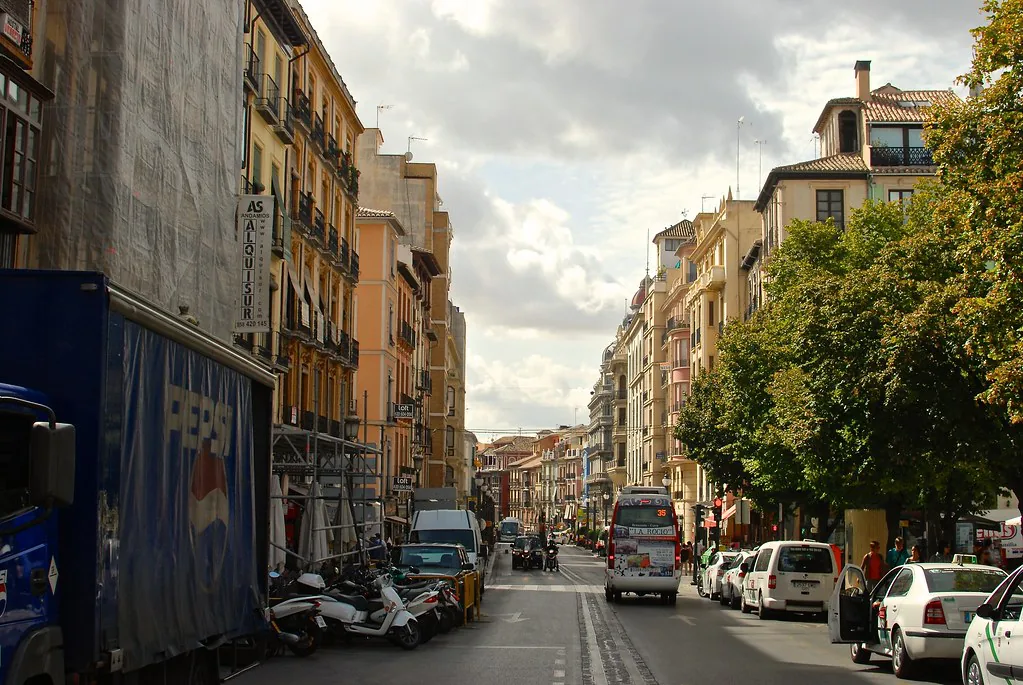 Plaza Santa Ana in central Granada, a typical evening tapas-crawl spot where locals dress smart-casual in November
