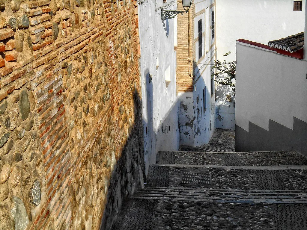 Plaza Santa Ana square in Granada, Spain, where evening tapas terraces call for an extra layer in October