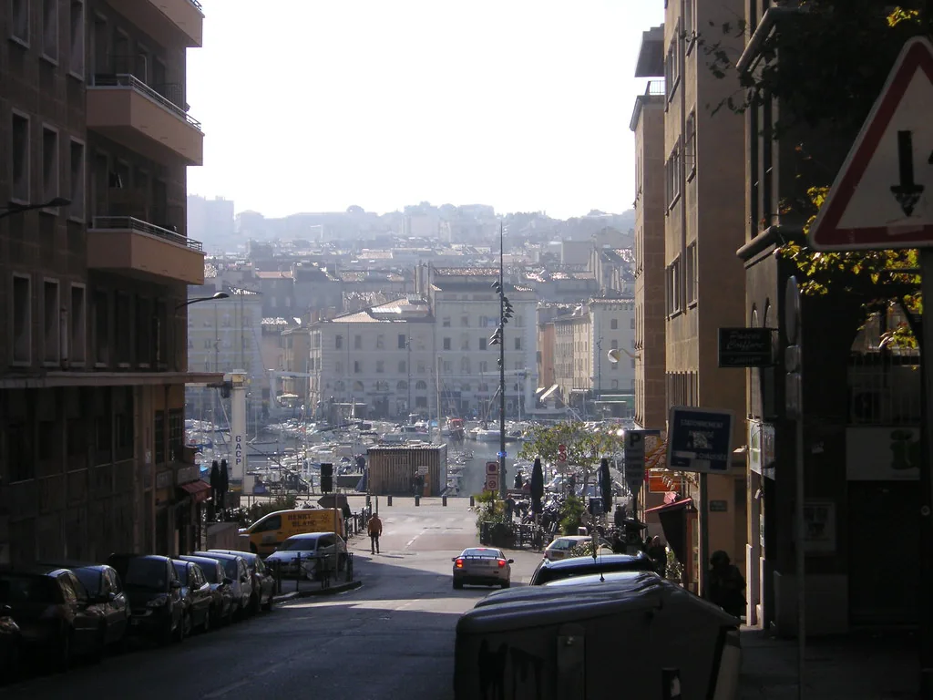 A Marseille street in autumn light, showing the kind of urban terrain and cool weather you dress for in November