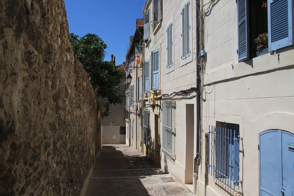 Marseille rooftops and harbor under bright blue Mediterranean sky, the deceptively cold clear days the Mistral brings