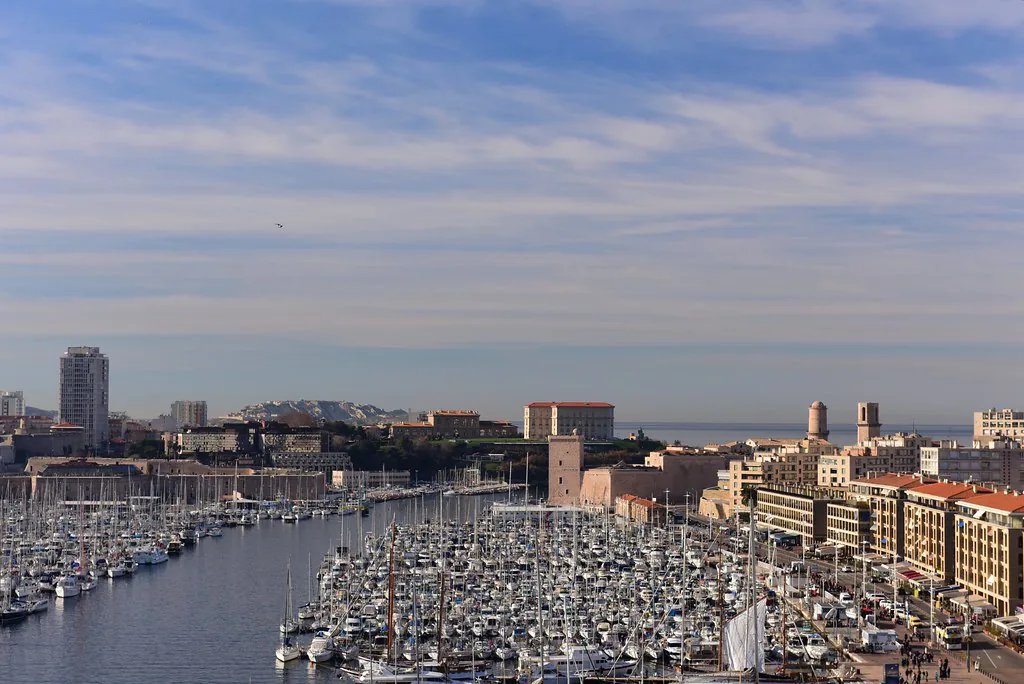 Panoramic view of Marseille's old town and waterfront, a guide to dressing for the city in September