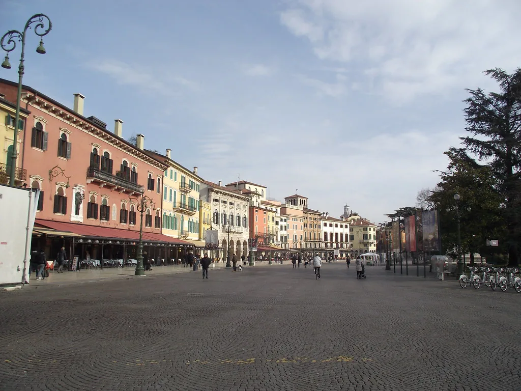 Historic Verona architecture and stone pavements that call for supportive walking shoes in September